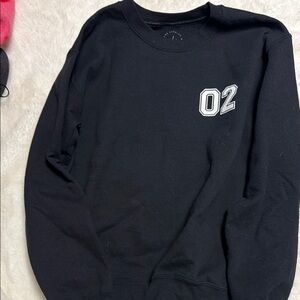 PacSun Black and White Crewneck Sweater with Bold Graphic